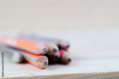 Pencils on a wooden table. Back to school