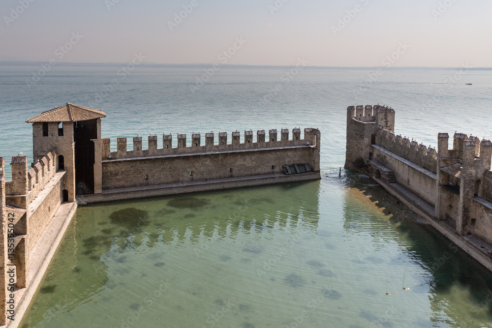 The fortress walls of Castello Scaligero in Sirmione on Lake Gar