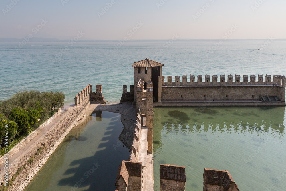 The fortress walls of Castello Scaligero in Sirmione on Lake Gar