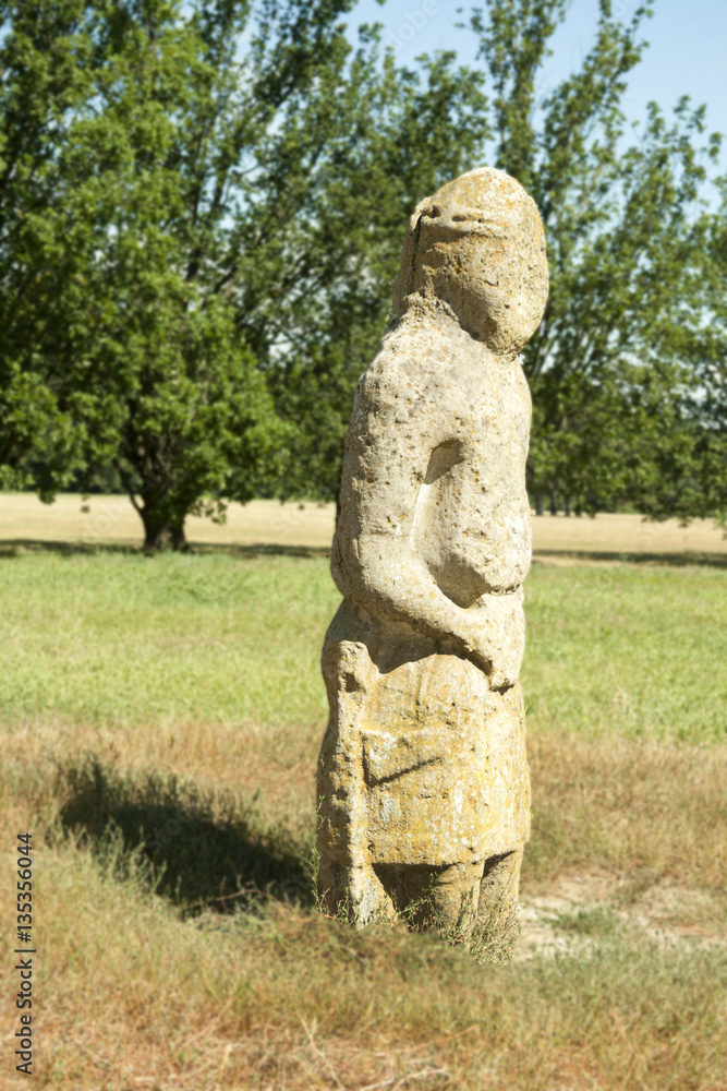 Ancient stone Scythian statue in the park