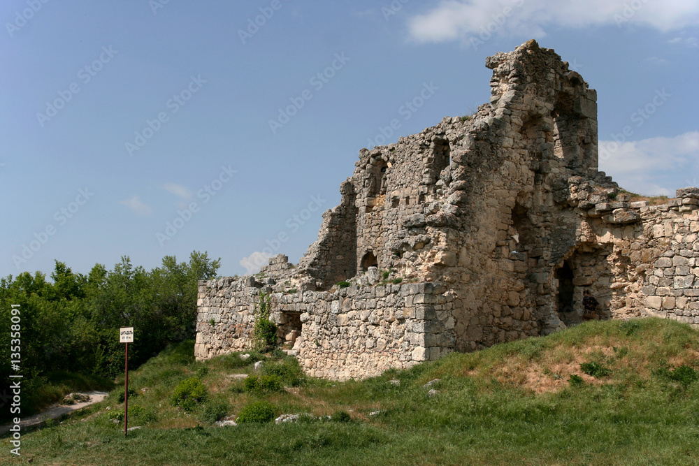 Stony ruins of the medieval fortress Mangup Kale in Crimean Mountains, Crimea. 
