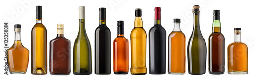 Set of wine and brandy bottles photo