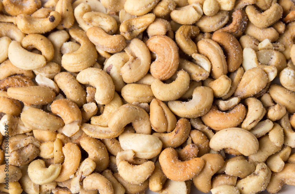 Cashew salty Indian nuts background pattern Cashew salty Indian nuts background pattern