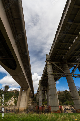 Chepstow Railway Bridge and modern road bridge over River Wye. © Andy Chisholm