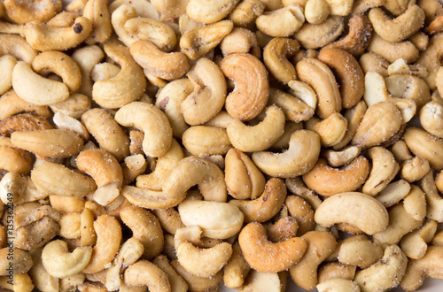Cashew salty Indian nuts background pattern