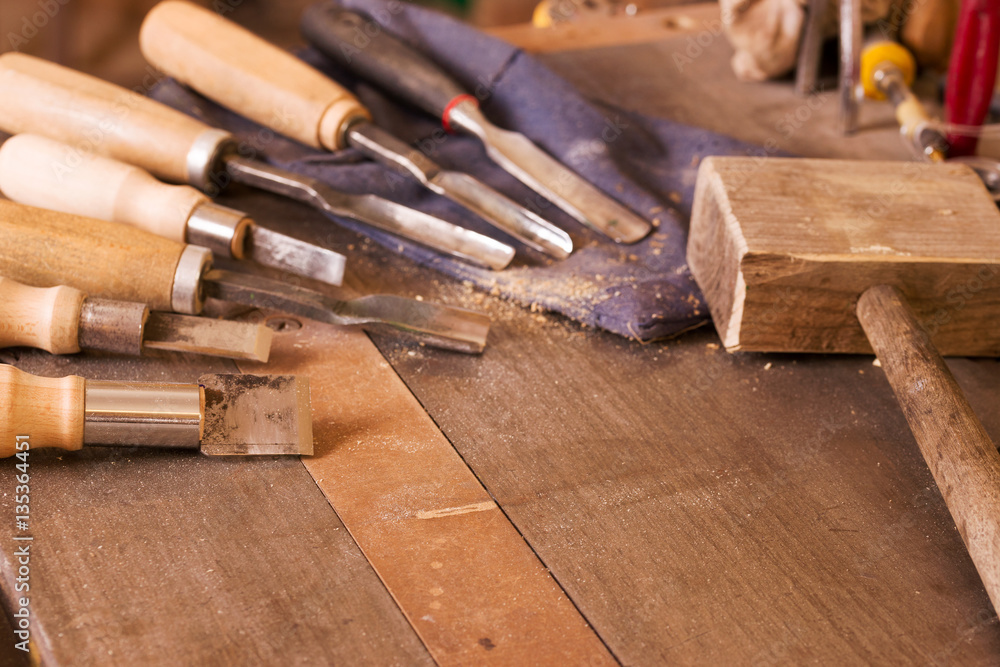 Carpenter tools on wooden table with sawdust. Circular Saw. Carpenter tools on wooden table with sawdust. Circular Saw.