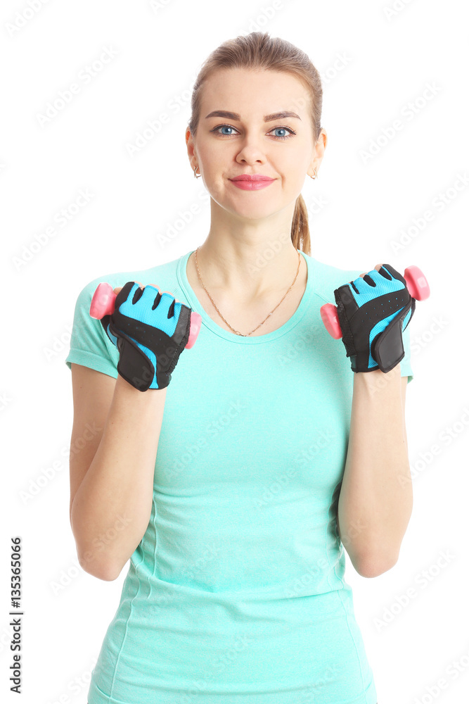 Smiling fitness woman doing exercises with dumbbells. Isolated on white. Smiling fitness woman doing exercises with dumbbells. Isolated on white.