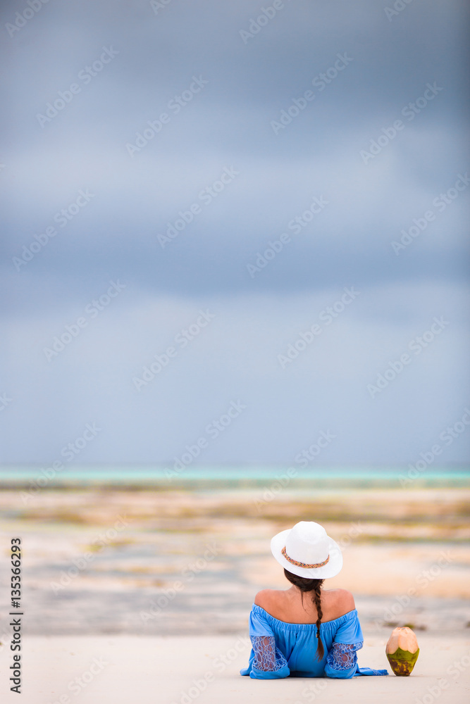 Young beautiful woman on beach vacation Young beautiful woman on beach vacation