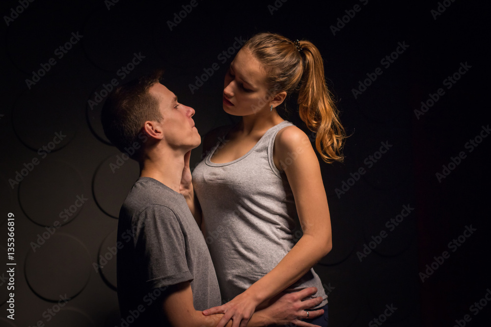 Passionate young couple in the room