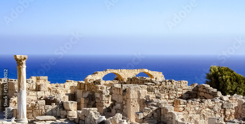 Beautiful scenery of the ruins of arches on a rock by the sea. / Ruins by the sea / Curion, Cyprus photo
