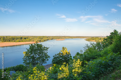 Fototapeta Naklejka Na Ścianę i Meble -  Beautiful river view through the trees from a high place