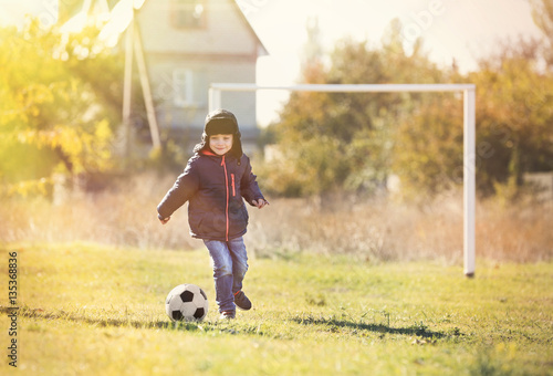 Cute little boy playing foo...