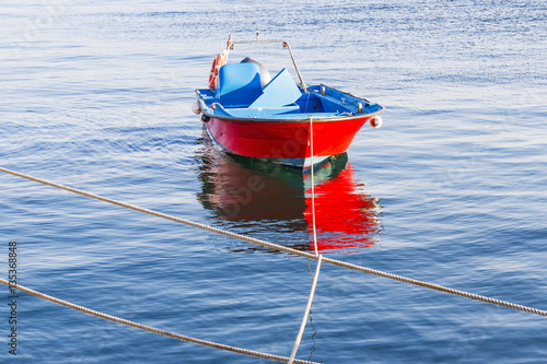 Red and blue fishing boat