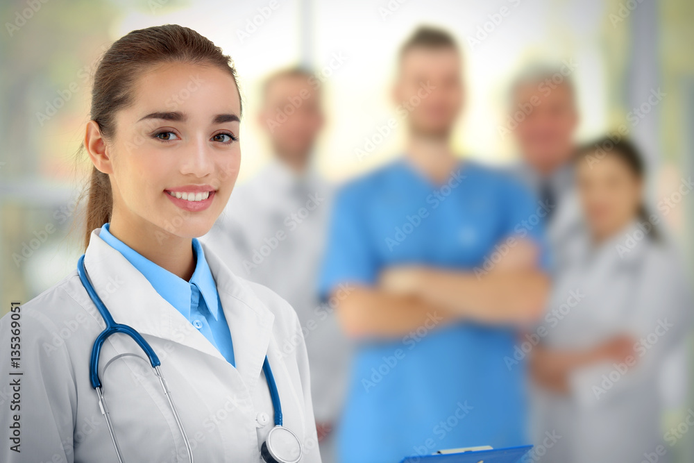 Young beautiful doctor in clinic Young beautiful doctor in clinic