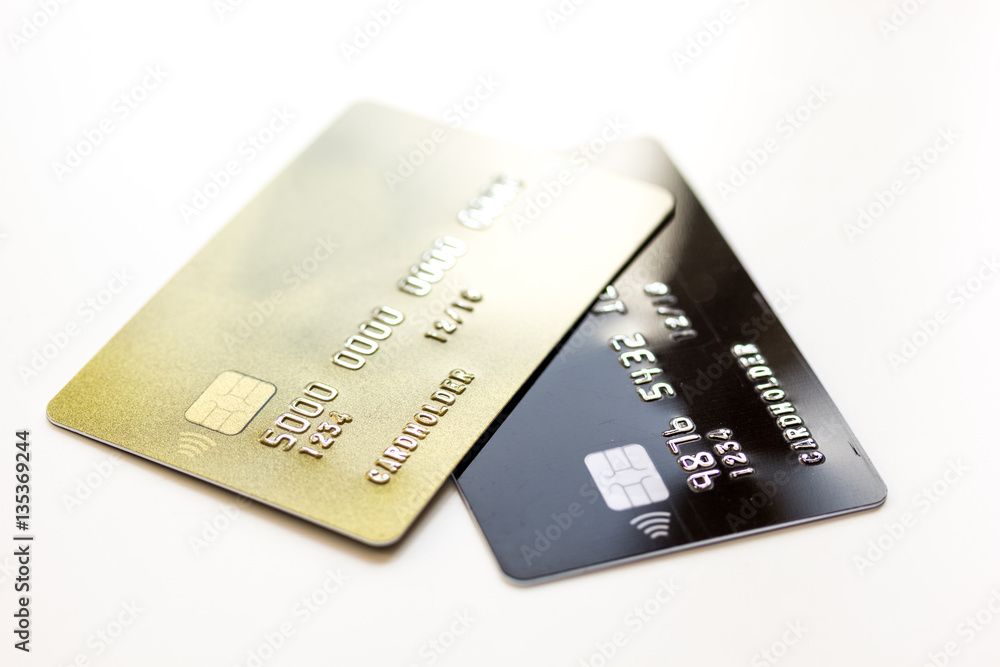 pile of credit cards on white background pile of credit cards on white background