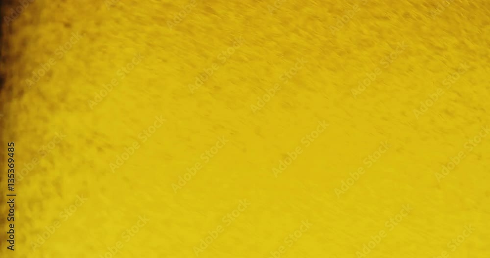 Glass full of beer slow moving bubbles 4K 4096X2160 Glass full of beer slow moving bubbles 4K 4096X2160