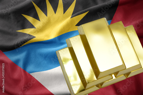 shining golden bullions on the antigua and barbuda flag