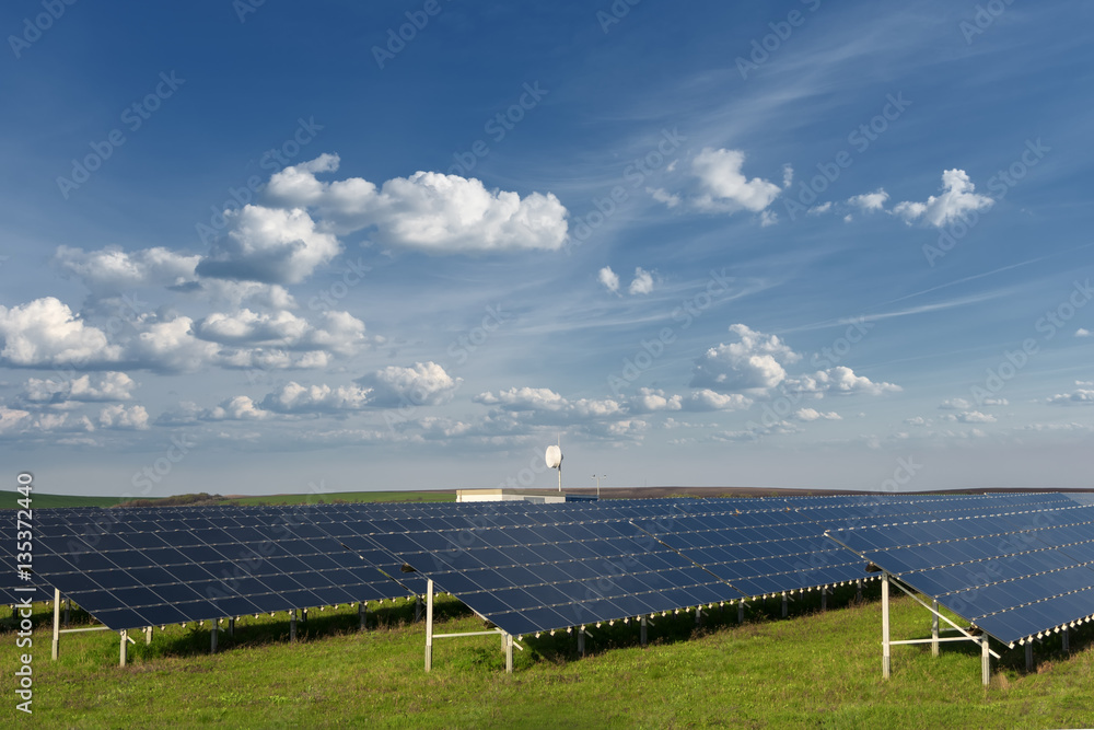 Solar cell panels in a photovoltaic power plant. Renewable energy - alternative electricity source Solar cell panels in a photovoltaic power plant. Renewable energy - alternative electricity source