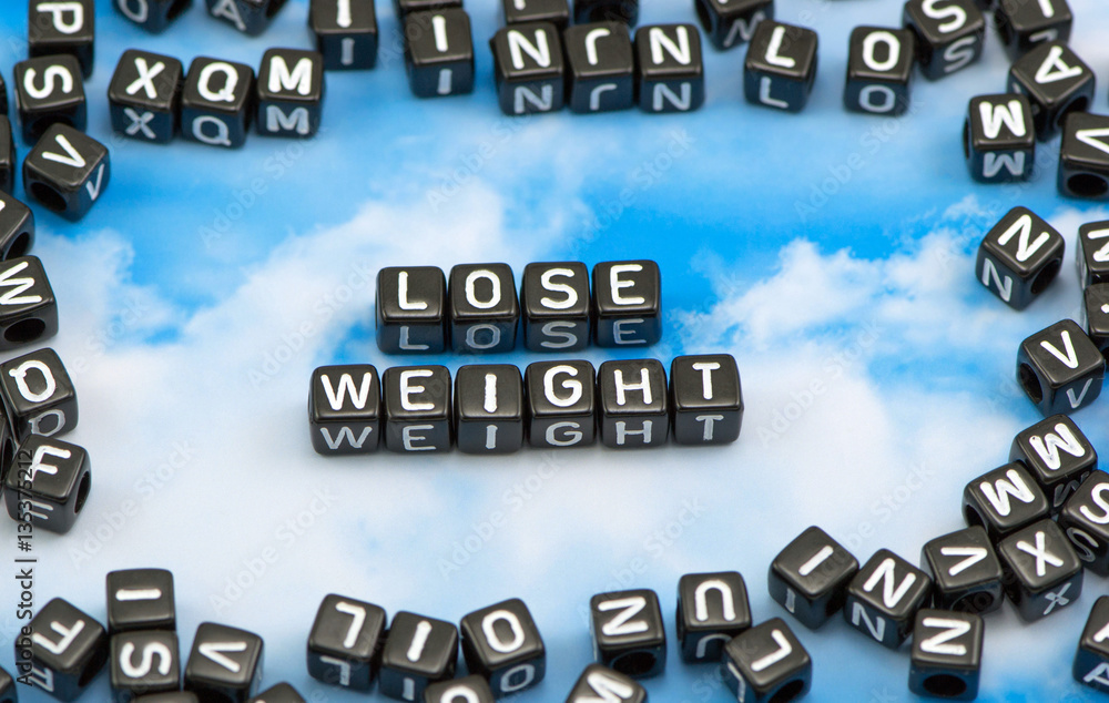 The word Lose weight on the sky background The word Lose weight on the sky background