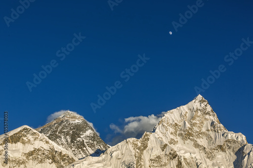 The Moon  mount Everest  8848 m   and Nuptse  7864 m  in the evening  view from Kala Patthar  - Nepal  Himalayas