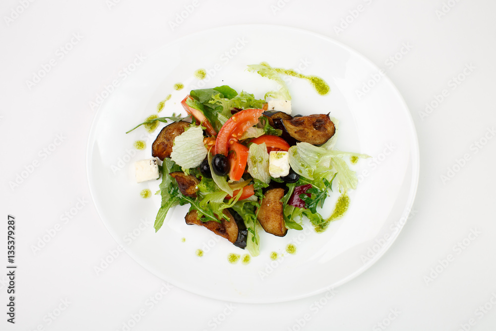 Vegetable salad on a white background Vegetable salad on a white background