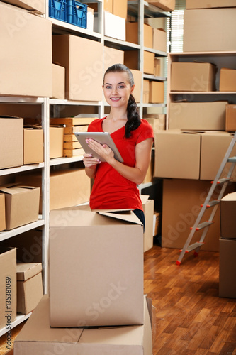 Young businesswoman with ta...