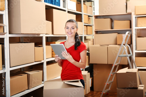Young businesswoman with ta...
