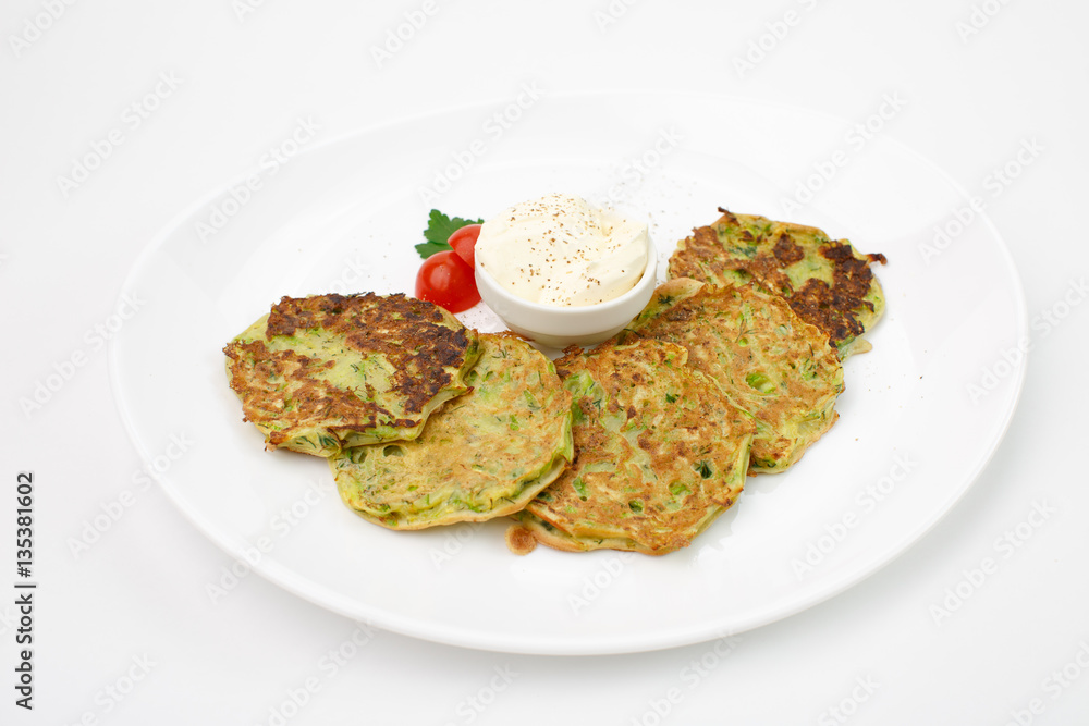 Jewish potato pancakes on white background Jewish potato pancakes on white background