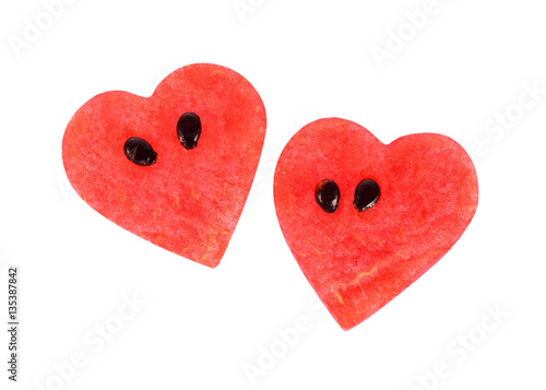 Two hearts made of red watermelon fruit isolated on white background, Valentines collection.