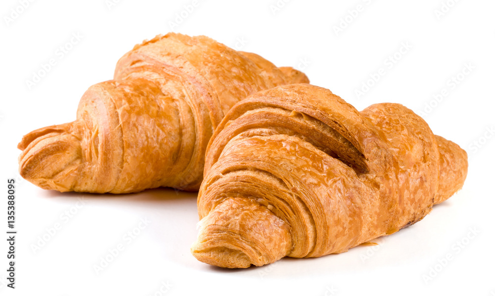 two croissant isolated over a white background closeup two croissant isolated over a white background closeup