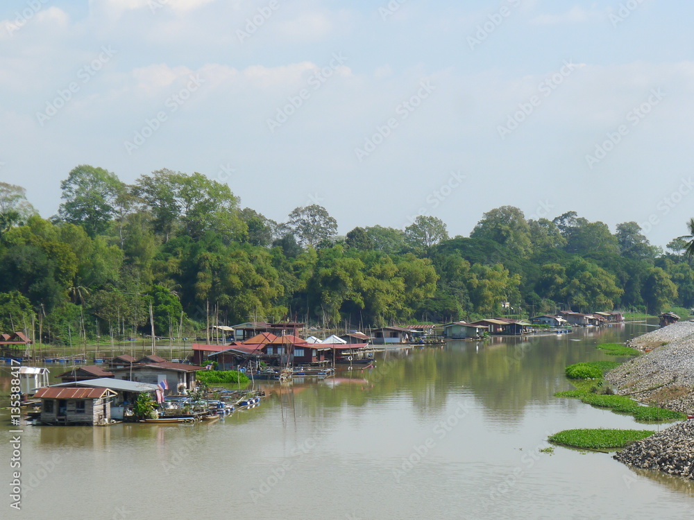 Houses along the river in Asia