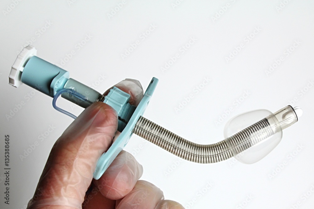 Reinforced tracheostomy tube with polyurethane cuff and inserted