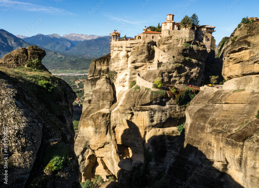 The Meteora is one of the largest and most precipitously built complexes of Eastern Orthodox monasteries. The six monasteries are built on natural conglomerate pillars. Greece, October, 2016.