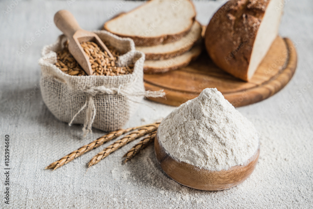 wheat and flour on the table wheat and flour on the table