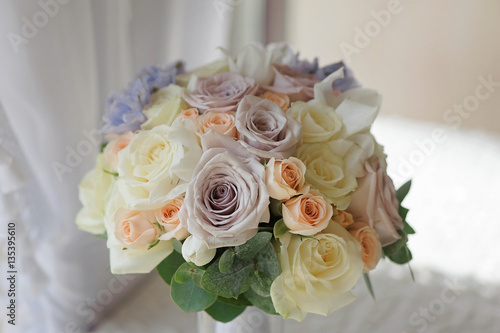 Closeup bouquet of flowers rose and delphinium wedding