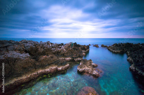 Fototapeta Naklejka Na Ścianę i Meble -  Stones in the sea on a long exposure 