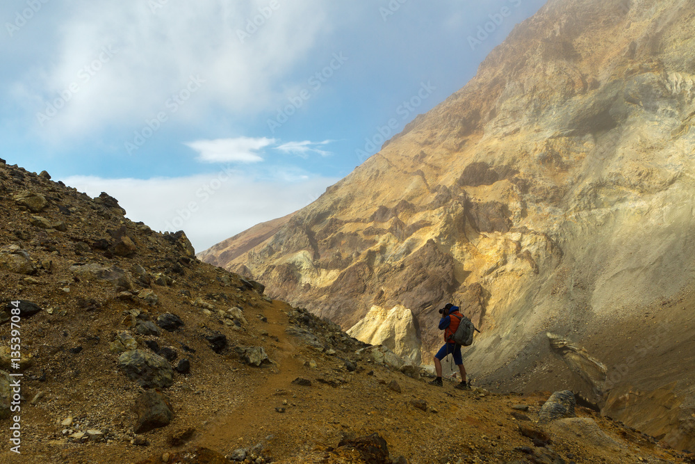 Fototapeta premium Climbing to active volcano Mutnovsky on Kamchatka.