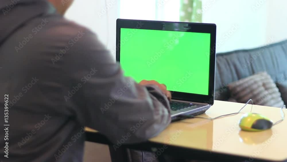 man using laptop,green screen 