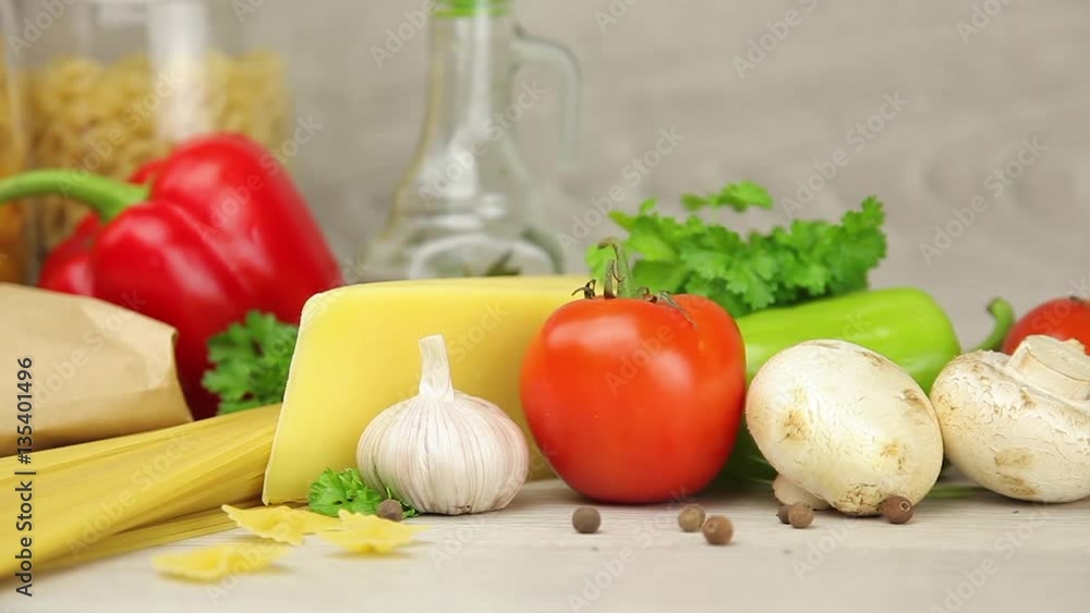 fresh vegetables, cheese, and uncooked pasta fresh vegetables, cheese, and uncooked pasta