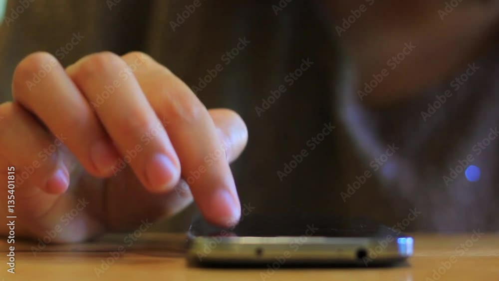 young woman using touchscreen mobile phone young woman using touchscreen mobile phone