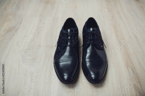 beautiful black leather and lacquered shoes for the groom
