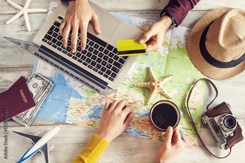 People planning vacation trip with map photo