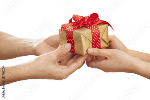 People giving gift in box photo