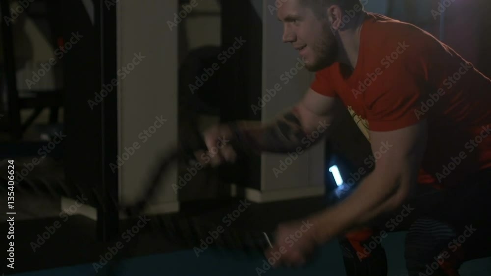 The man is engaged in the gym The man is engaged in the gym