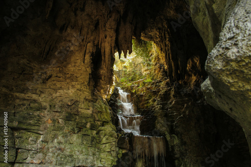 Cave and waterfall in the park of Paris