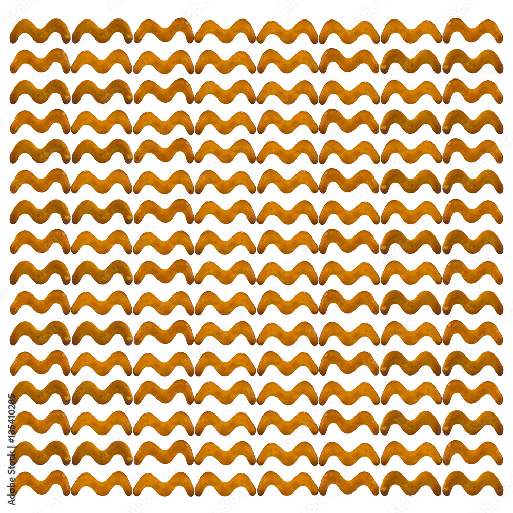 Cracker cookies in the shape of a zigzag fill the page isolated Cracker cookies in the shape of a zigzag fill the page isolated