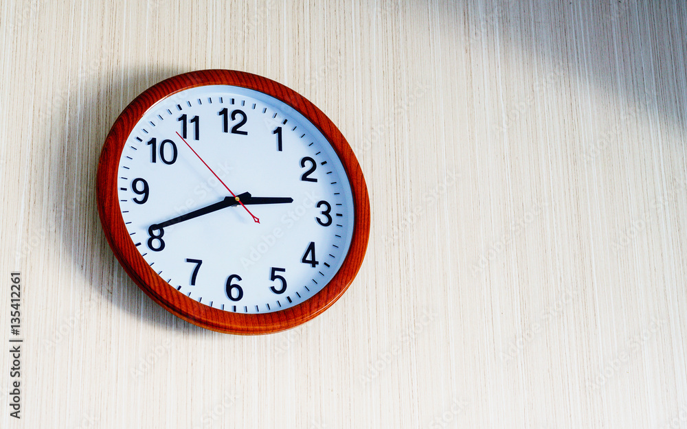 clock hanging at the wall with copy space clock hanging at the wall with copy space
