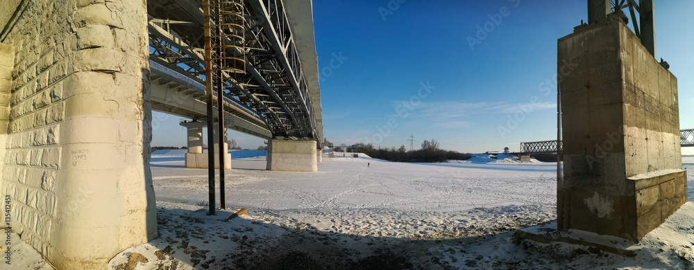 Two bridges over the river Sozh in winter