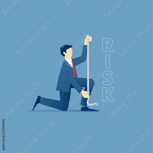 Businessman measures a risk with measure tape
