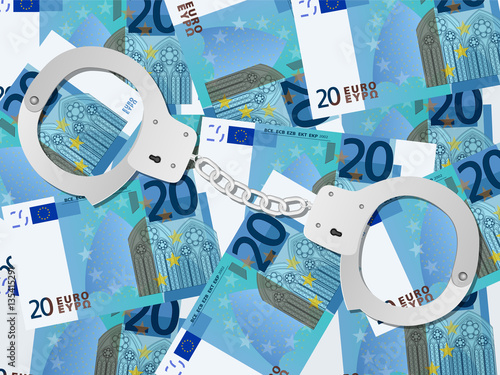 handcuffs on twenty euro background
